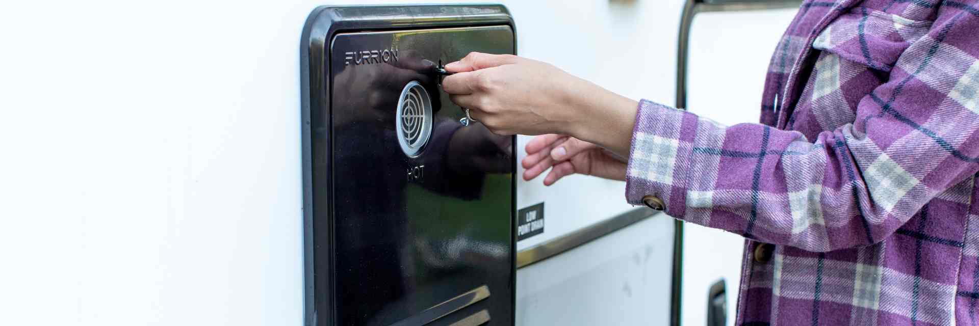 what to know about RV water heaters before you buy